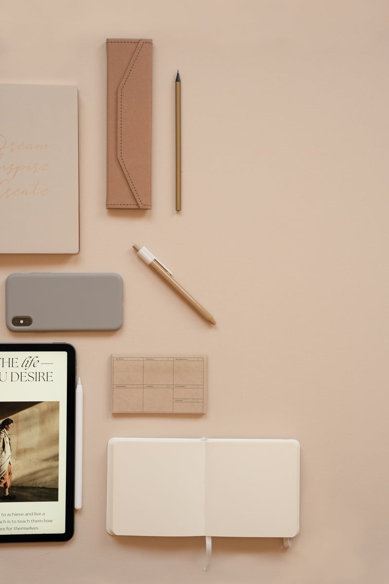 Elegant Office Flatlay of Office Supplies and Gadgets